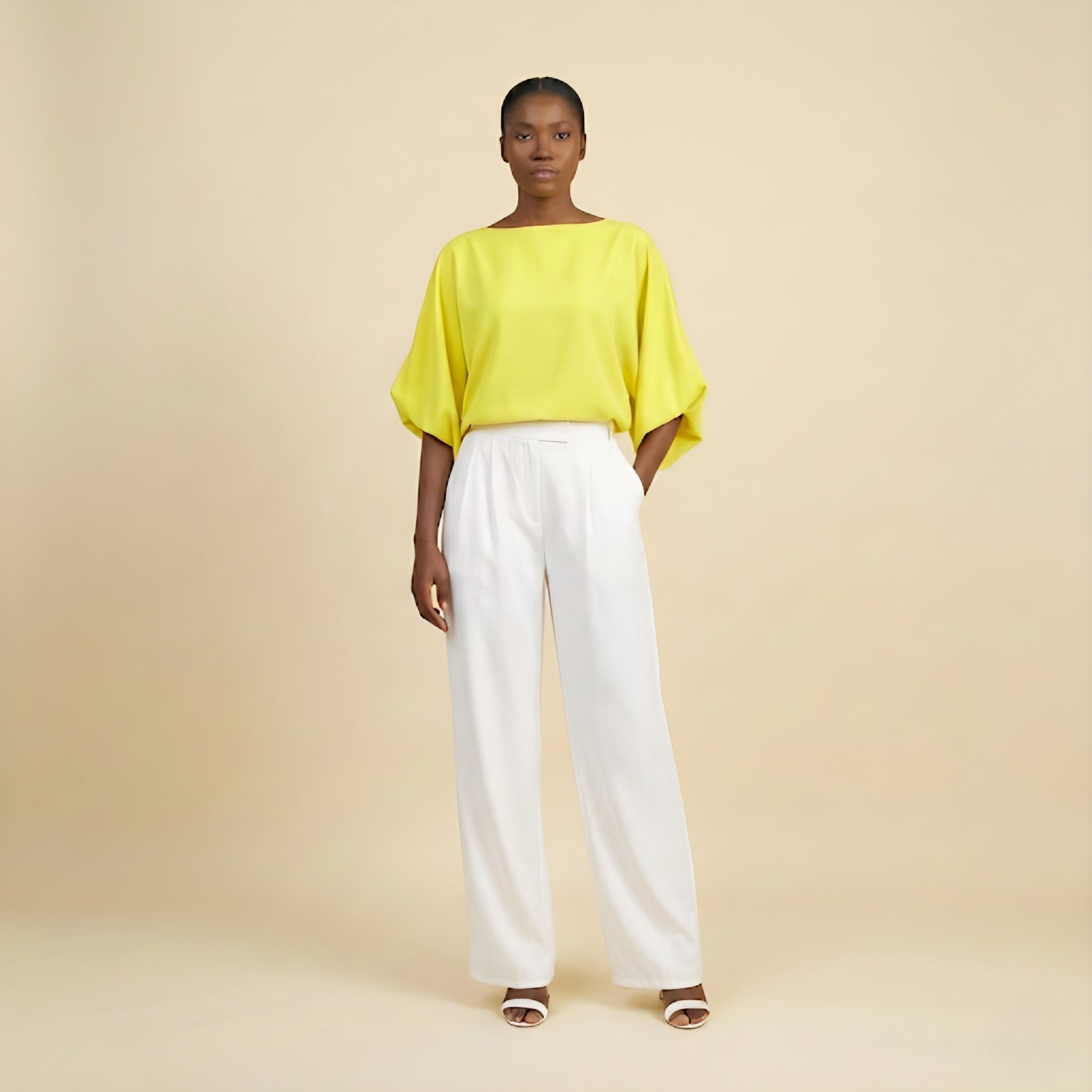 White wide-leg pants and flowy sun-kissed top set.