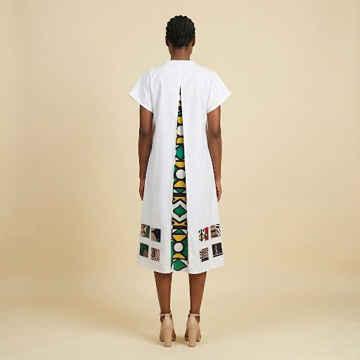 White twill dress with printed back.