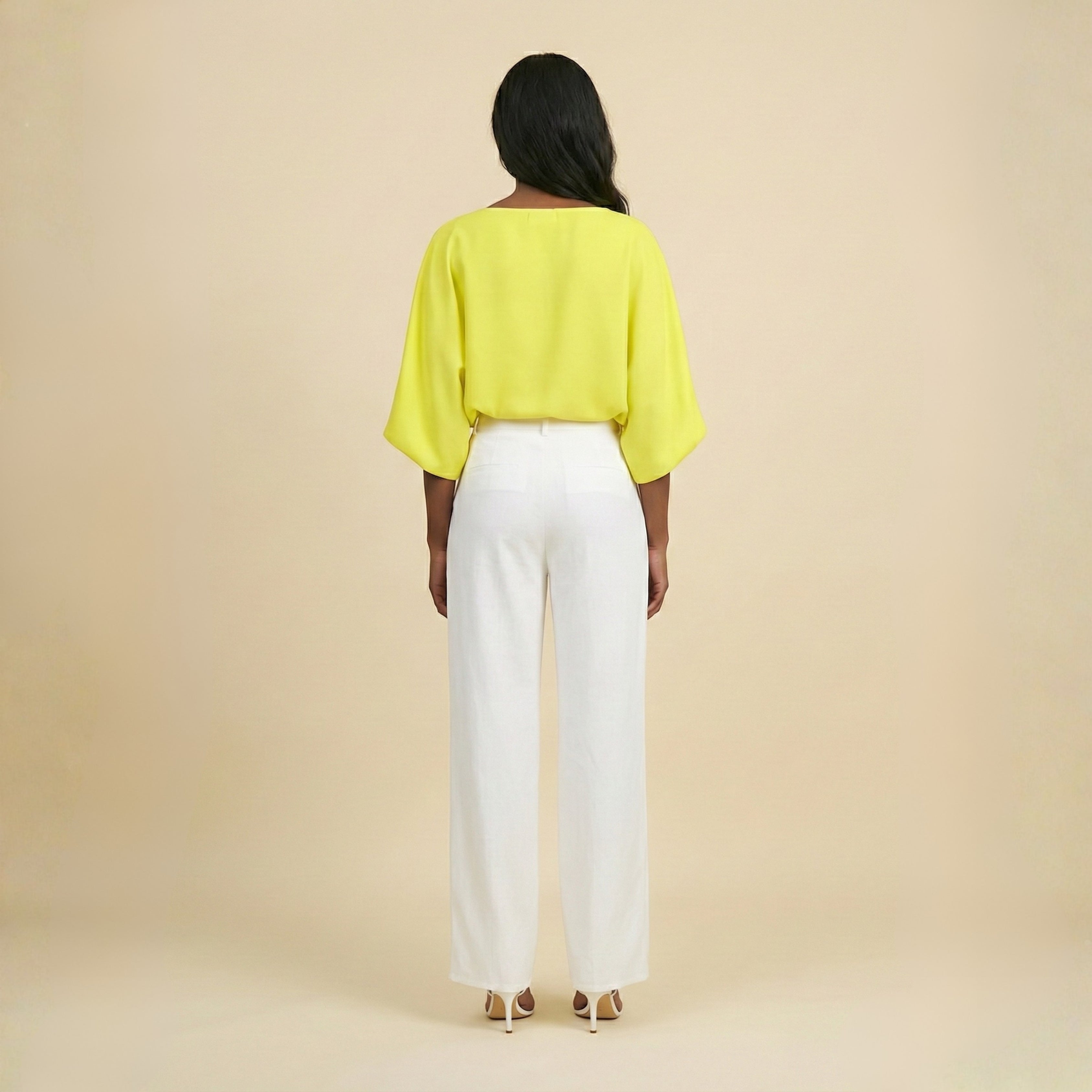 White wide-leg pants and flowy sun-kissed top set.