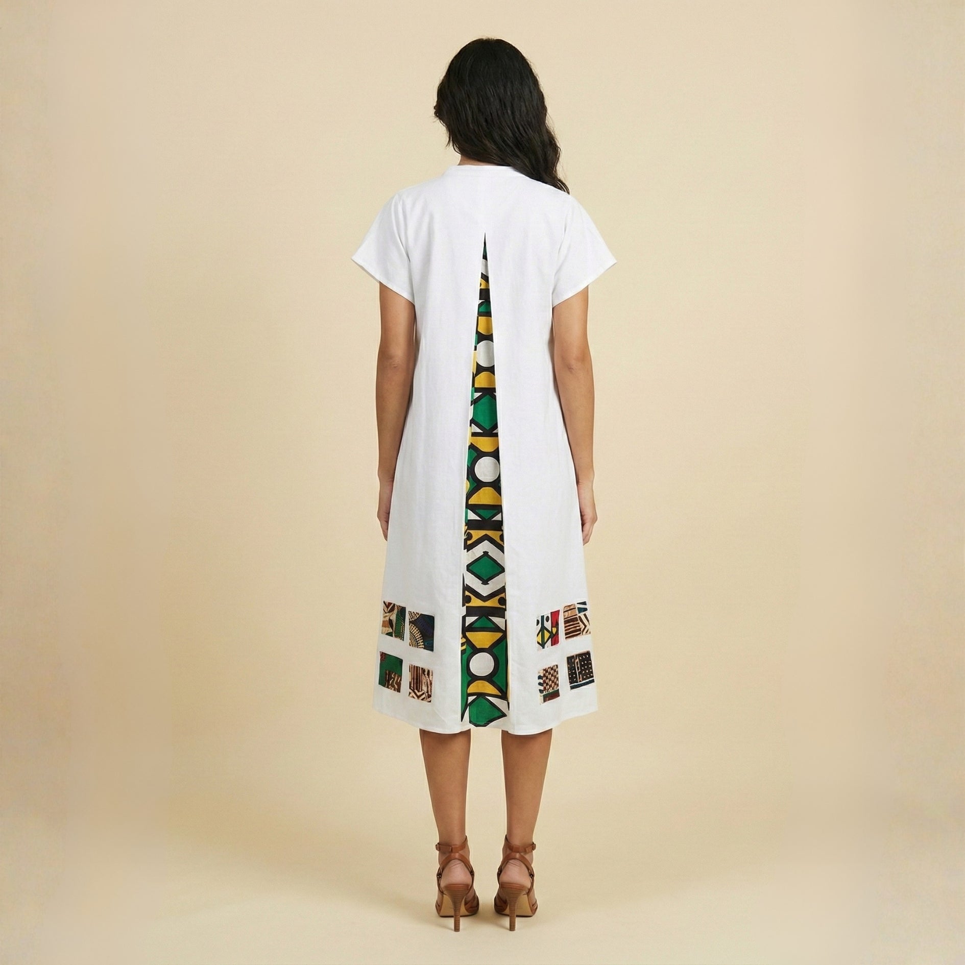 White twill dress with printed back.